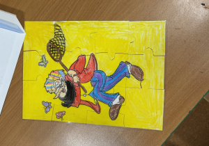 układanie przez uczniów gotowych puzzli lekturowych